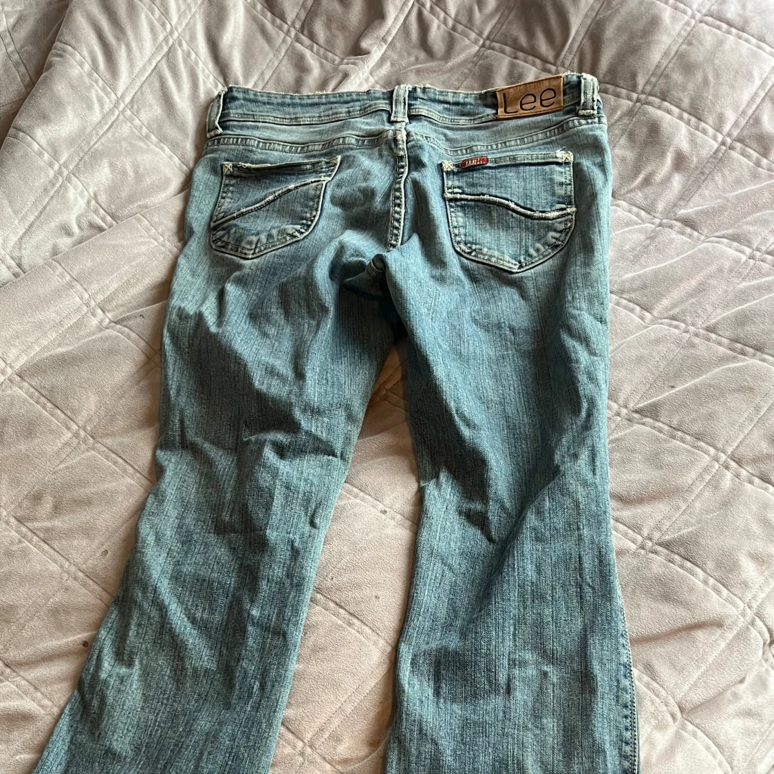 Lågmidjade jeans från lee  storlek: 29 - 90