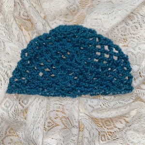 Virkad mössa till Ebba - -