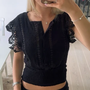 Svart blus  - Svart blus. Aldrig använd