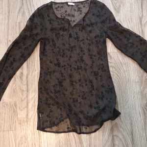 Mesh blus - En mesh blus som har blivit använd ett fåtal gånger