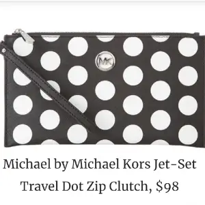 Michael Kors Jet Set Travel Zip Clutch. Helt ny oanvänd med yttre och inre emballage (plast) kvar. 