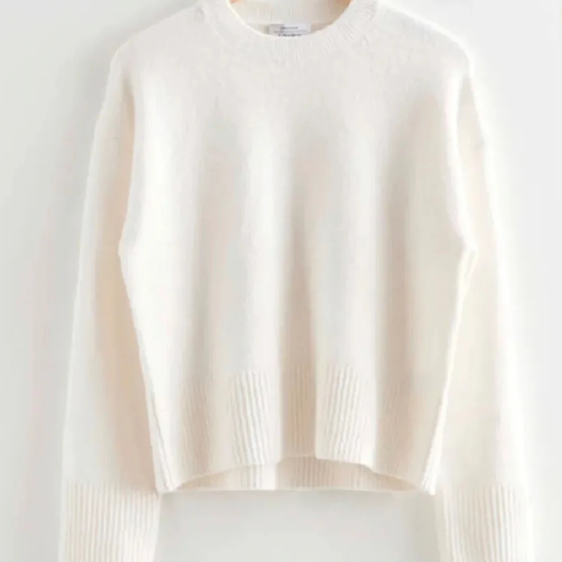 Vit stickad tröja