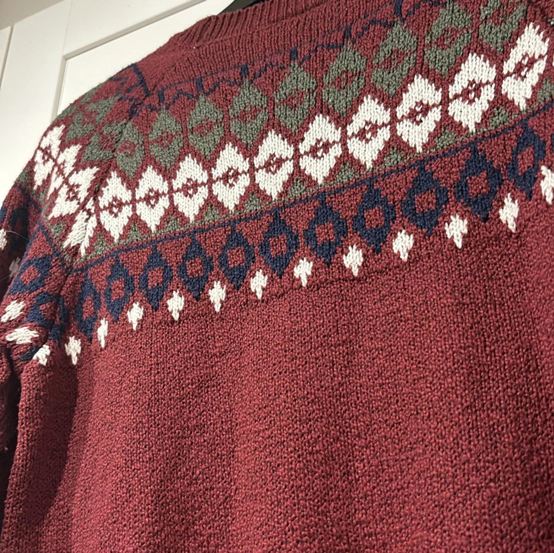 En finstickad jultröja  - 91