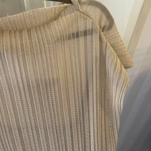 Klänning glitter  - River island, oanvänd, faller fint 