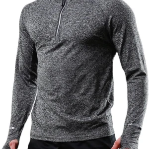 Grå långärmad tröja med dragkedja - En grå långärmad tröja med dragkedja framtill. Tröjan har en huva och är tillverkad i ett bekvämt material som passar bra för träning.