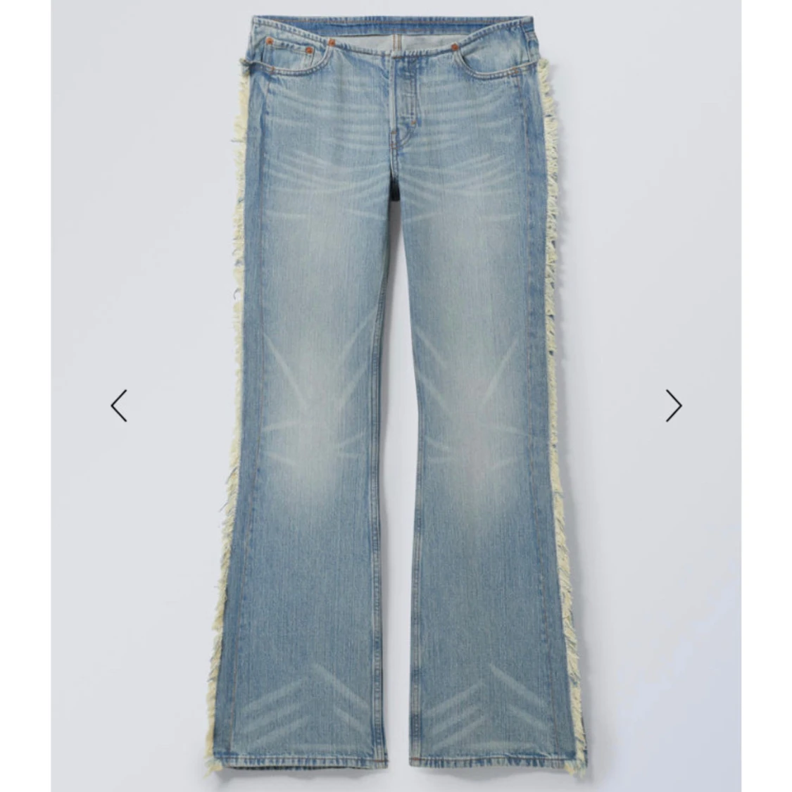Lågmidjade bootcut jeans med fransar - 92