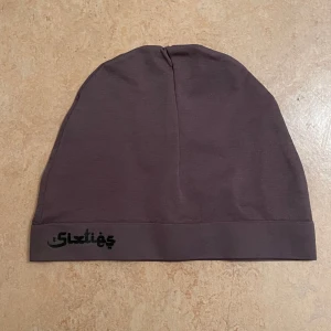 Sixties mössa - Säljer en skixties mössa helt ny. Storlek one size 