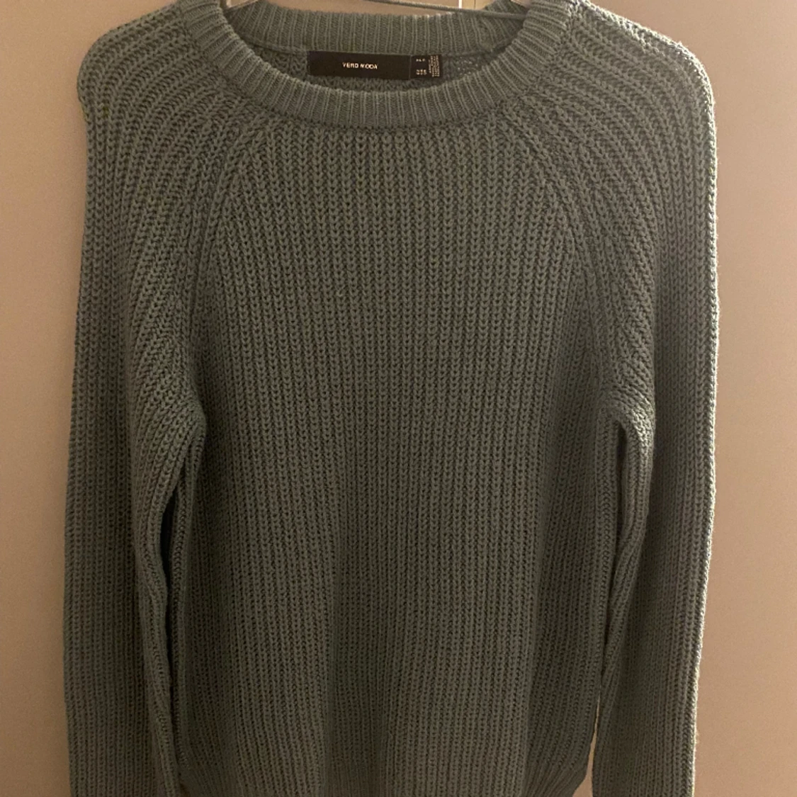 Mörk turkos stickad tröja