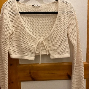 Kofta - Stickad kort kofta 