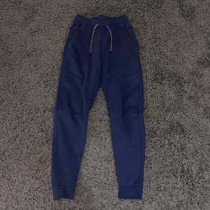 Nike tracksuit byxor marinblå