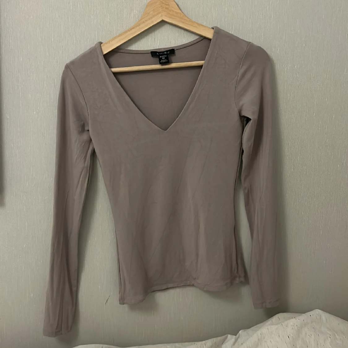 V formad långärmad