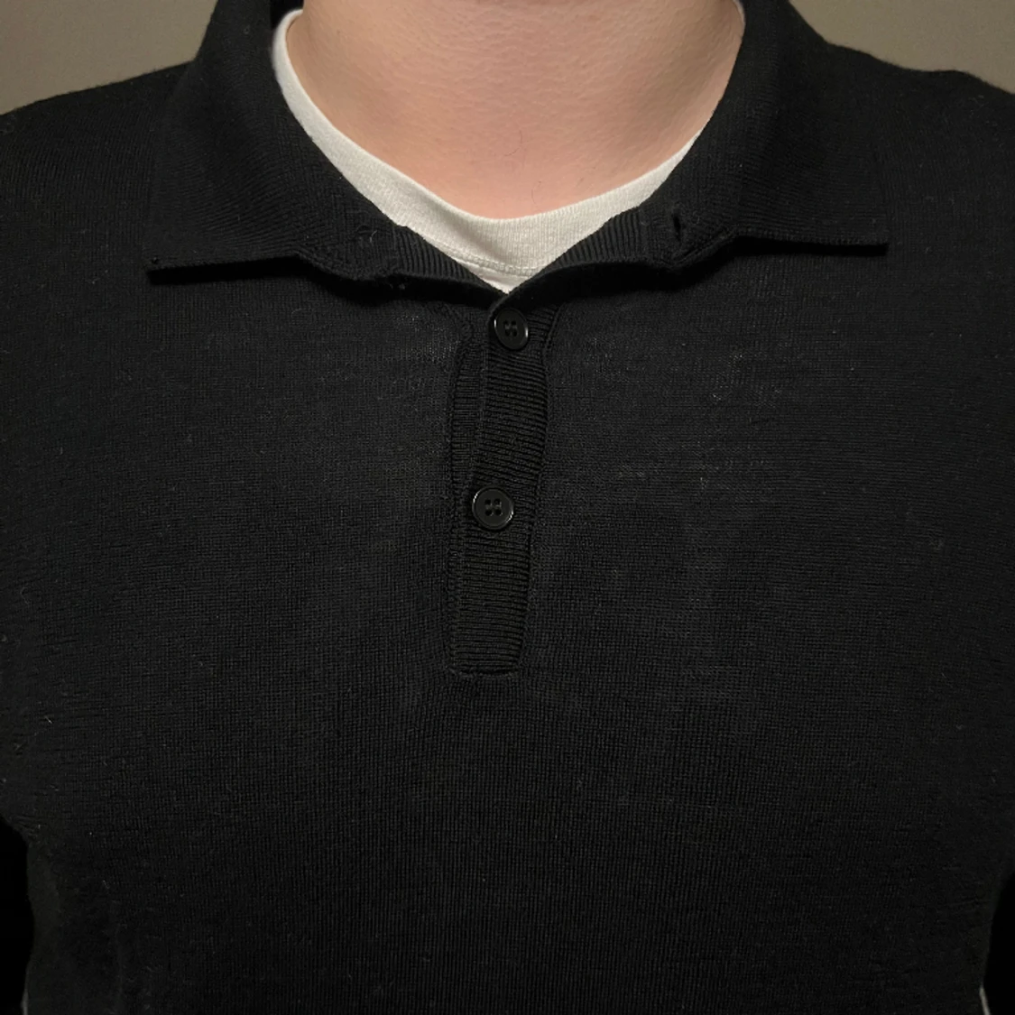 Svart stickad tröja