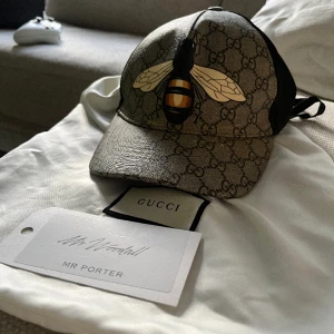 Gucci Keps - Gucci keps, bra skick. Har ej lådan kvar tyvärr men resten går nog att rota fram