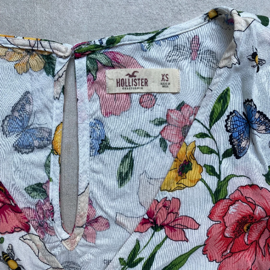 Blommig byxdress - 91