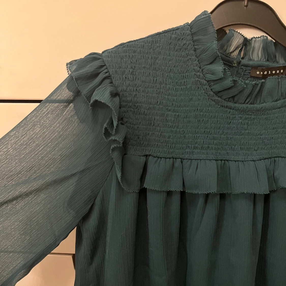 Långärmad blus med volang - 91