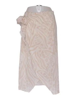Beige omlott-strandkjol med mönster - Säljer en transparent beige omlott-strandkjol med ljusa djur- och zebramönster. 