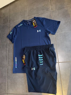 Under Armour set reflektiv stl L passar M - helt ny passar M