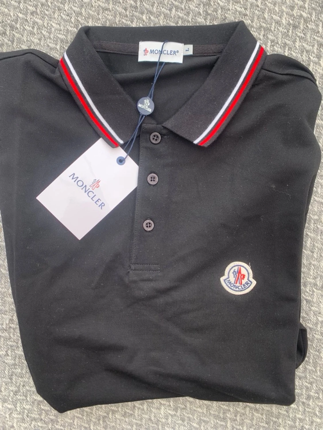 Svart pikétröja från Moncler - 2