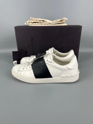 Valentino Open Sneaker Black | 43 - • The shoes have been gently used and are in very good condition  • Size: 43 (fits 43.5–44)  • Color: Black  • Retail price: 7280 SEK / 590€  • Box, dustbag, new laces & valentino card included