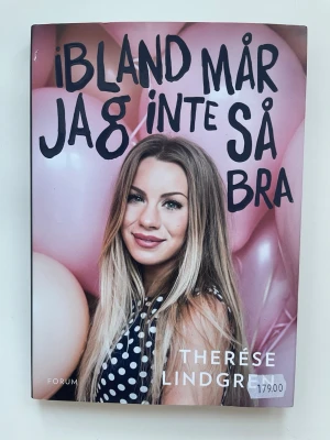 Ibland mår jag inte så bra - En helt ny och oläst bok av Therése Lindgren med rosa omslag och ballonger i bakgrunden. Omslaget har stora svarta bokstäver och ett foto på författaren. Boken handlar om psykisk ohälsa, ångest och personliga erfarenheter, skriven på ett ärligt och personligt sätt.