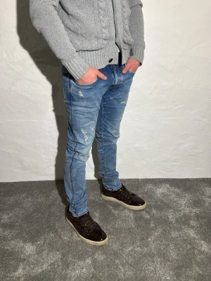 Replay jeans  - Ett par snygga jeans från Replay i storlek W31 L34 i modellen Anbbas hyperflex 