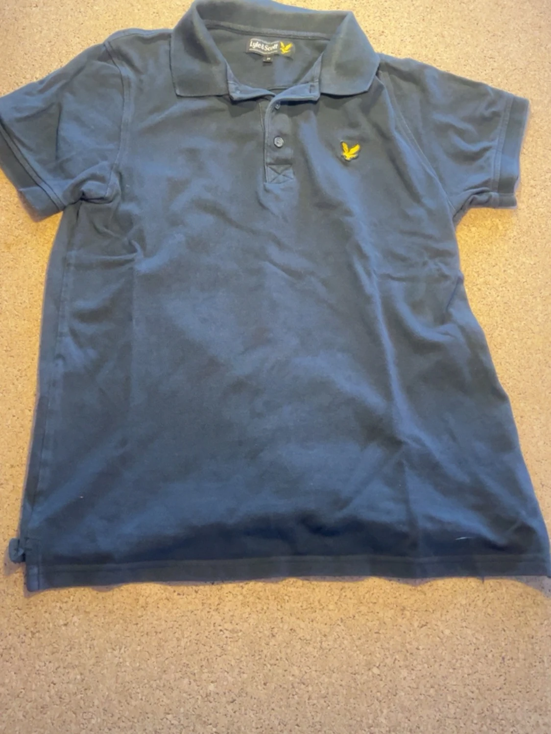 Blå pikétröja från Lyle & Scott