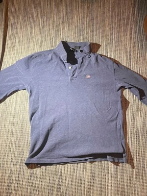 Blå långärmad piké från Ralph lauren polo jeans company - Mörkblå långärmad piké mycket bra skick