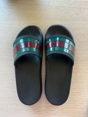 GG Slides - Tofflor/sandaler - Nya/oanvända. Storlek 42.