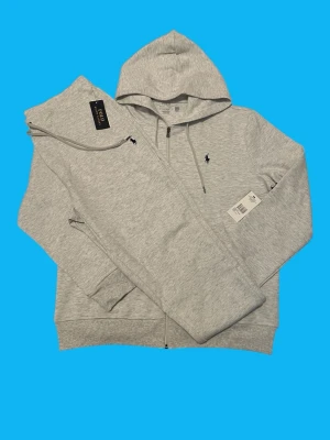 Ralph Lauren Tracksuit Size Large (Light grey) - Brand: Ralph Lauren Condition: Brand new  Color: Light grey Size: Large Measurements: Pants length 104cm waist 40-50 Zip hoodie length 68cm shoulder 48cm  • Message for questions or offers  • Cheaper if you buy more items • Delivery within 24hrs