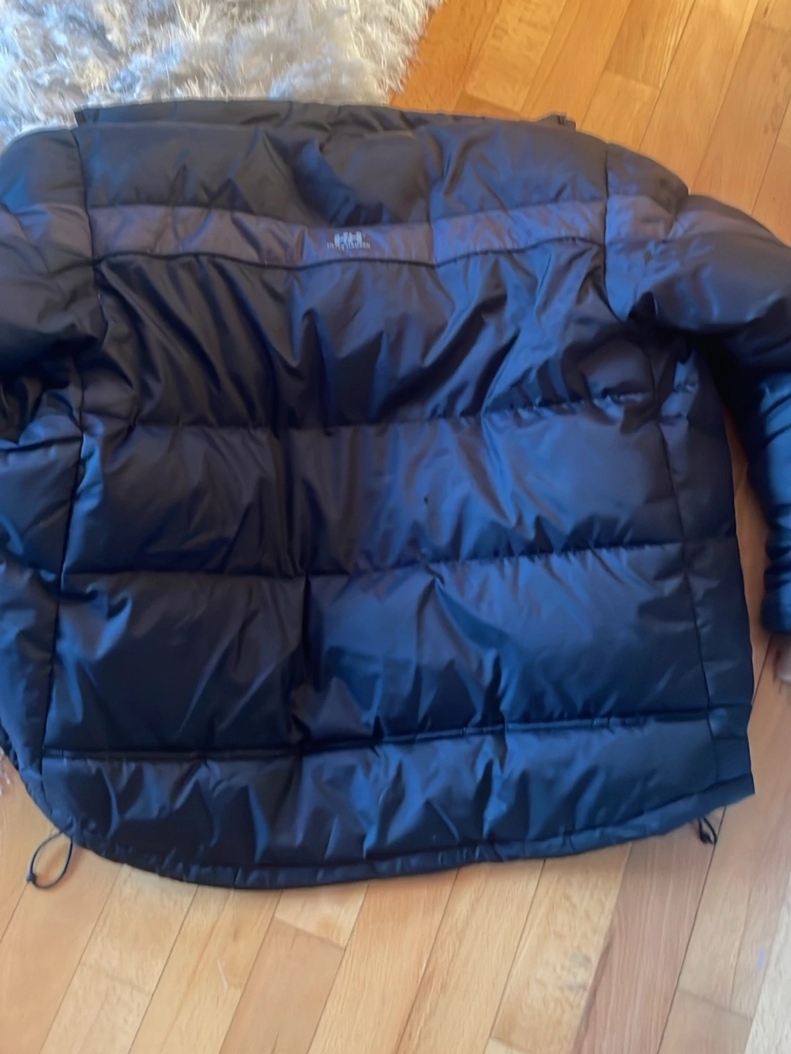 Svart pufferjacka från Helly Hansen