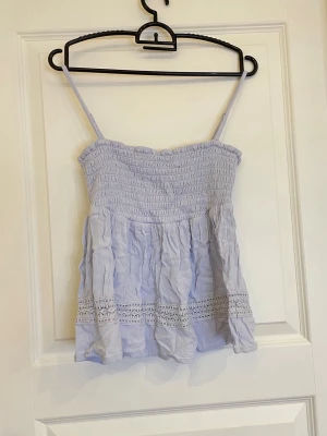 Somrig topp💕 - En ljusblå somrig topp som är luftig 