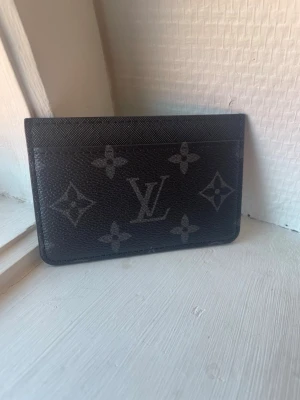 L v korthållare - L V korthållare svart