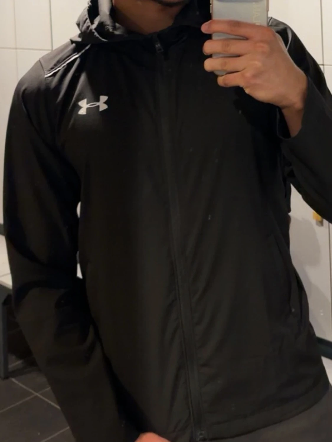 Svart hoodiejacka från Under Armour