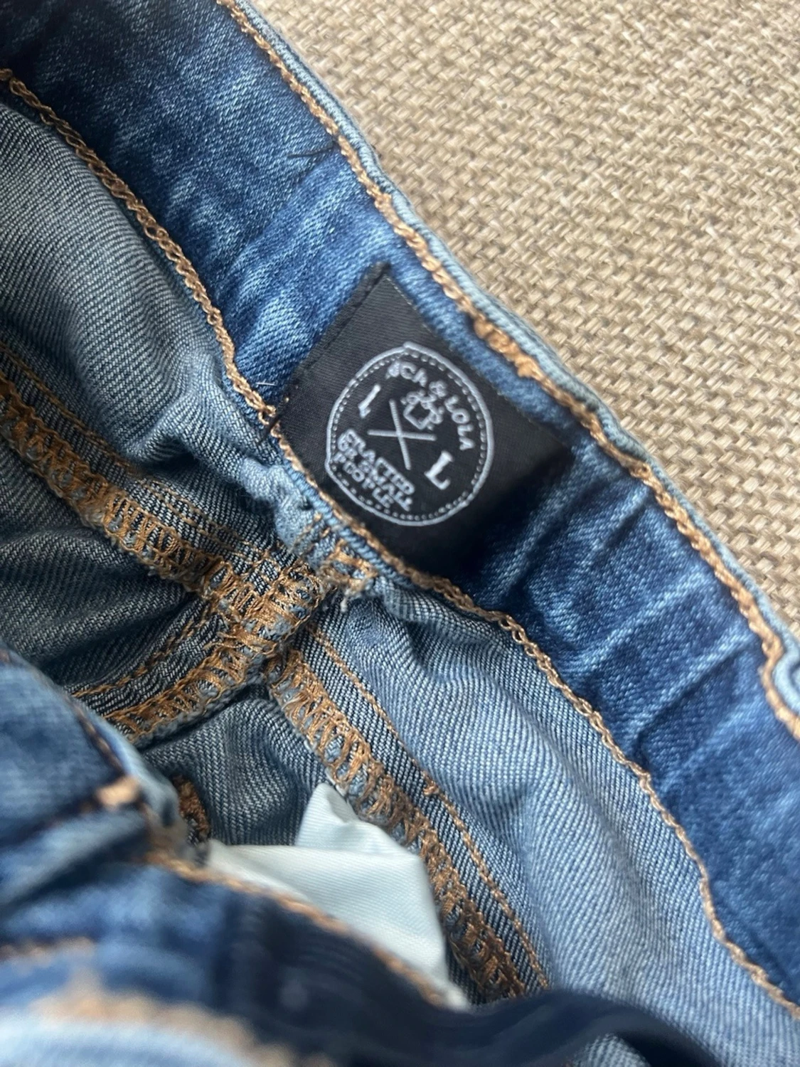 Blå slitna jeans  - 1