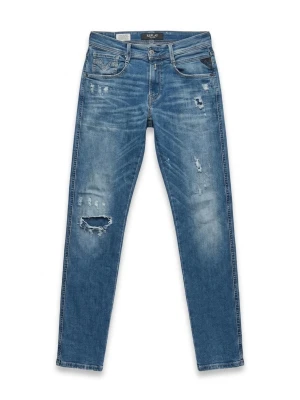 Blå slitna jeans från Replay - Säljer ett par blå jeans från Replay med skinny fit och slitna detaljer på benen. Jeansen är Anbass och använt fåtals gånger, hör av dig vid funderingar!