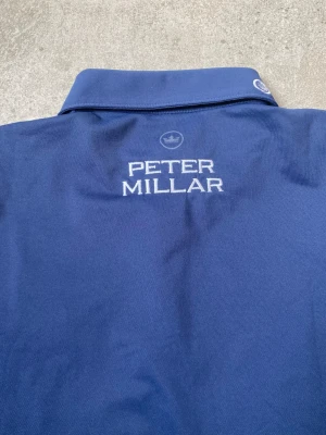 Peter Millar Crown Crafted Tour Polo - Peter Millar Crown Crafted Tour Polo  Rare piece from the Peter Millar Tour Line. Part of the premium Crown Crafted range with a refined athletic fit and elevated performance fabric.  Size Small — fits a standard Medium. Retail: $180.