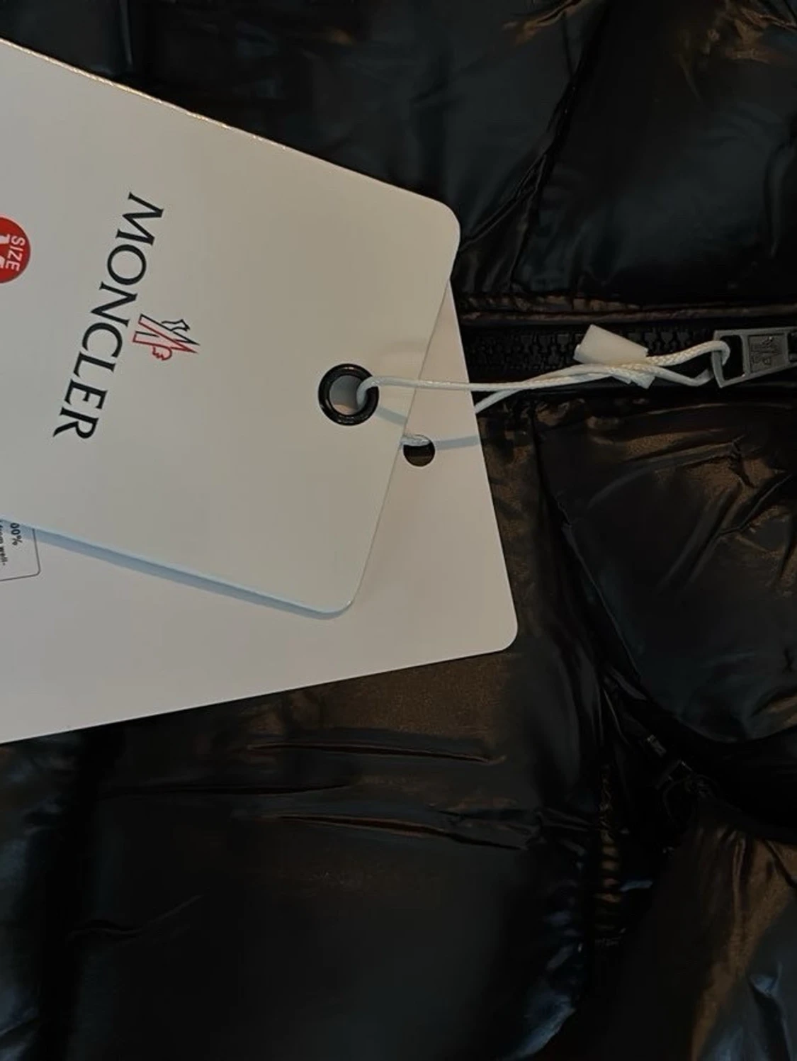 Svart dunväst från Moncler med huva - 1