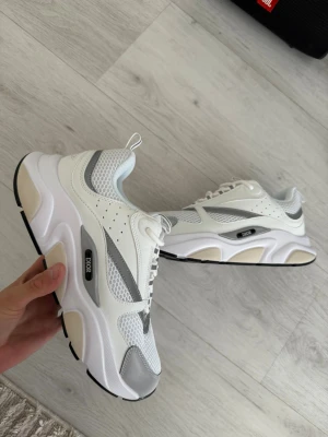 CD white shoes B22 - Size 44, true to size. As new, never worn. 