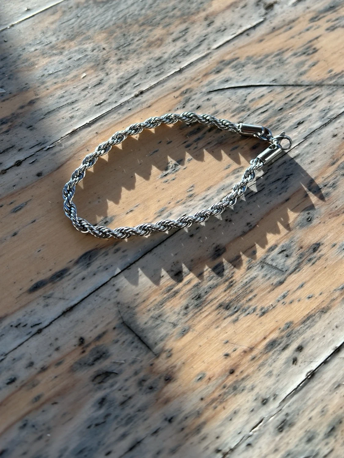 Flätat silverfärgat armband - 1