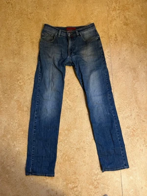 Baggy Jeans - Blå baggy jeans 33/32