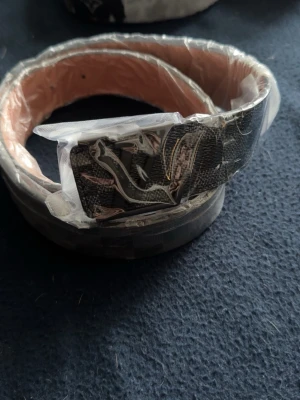 Bälte - Svart logga   Helt ny