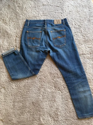 NUDIE DRY SELVAGE JEANS - Nudie Jeans ”Dry Orange Selvage”✔️W31 L28✔️Skriv vid minsta fundering✔️