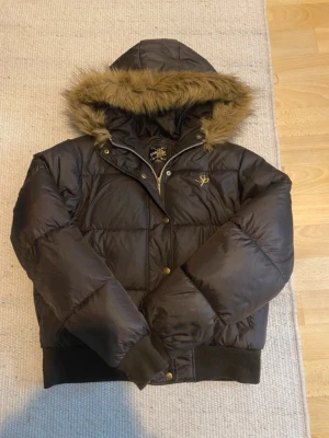 Brown Southpole puffer jacket.  - Barely used, selling simply because I have way too many jackets.   Jacket is pretty small even though it says size L. Fits more like a S. 