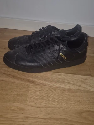 Adidas gazelle - All black ones , pretty good condition and fits with any denim really nice, size 44 , you can  tell that they have been used a bit by looking on the sole, but i would say that overall they are still in a good condition