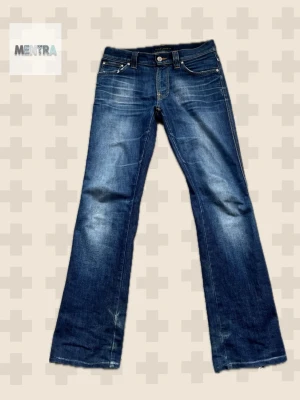 Vintage nudie (Slim,Jim) 29,34 - (29,34)Pair of jeans From around 2010-2012!!! tha has lived a crazy life. Crazy heeldrag with a perfect fit over the shoe(bootcut) and incredible fades on the jean’s especially under the pockets. Message me if you have any questions!!!       Measurements length:100cm waist:40cm leg opening:20 cm