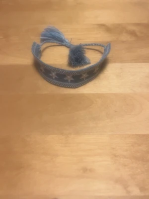 Blått armband - Helt nytt blått armband. 