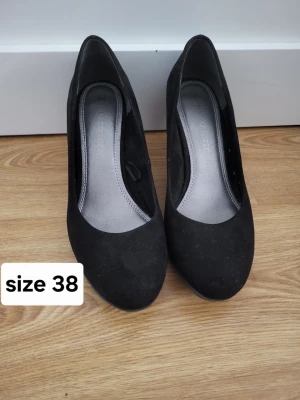 Black pumps - Classically stylish pumps for every occasion by Marco Tozzi. Used, minimal wear.  Bundle discounts: two items 5% off (automatic) three items 10% off, five items 20% off. Message me before purchasing 3+ items for discount.