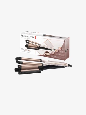 Remington PROluxe 4 in 1 vågtång  - Remington PROluxe 4-i-1 vågtång i snygg roséguld och vit design. Tången har keramiska plattor och flera värmeinställningar för att skapa olika typer av vågor i håret. (Se bild 5 och 6) Den är i nyskick och endast använd ca en gång! Original förpackning medföljer ej 