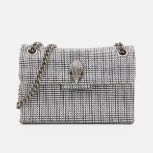 Glittrig Curt Geiger väska  - Snygg axelväska i svartvitt rutigt med silver stenar runt hela. Super snygg till mer uppklädda outfits men även för att göra en tråkig outfit roligare. Inga difekter! 🩶