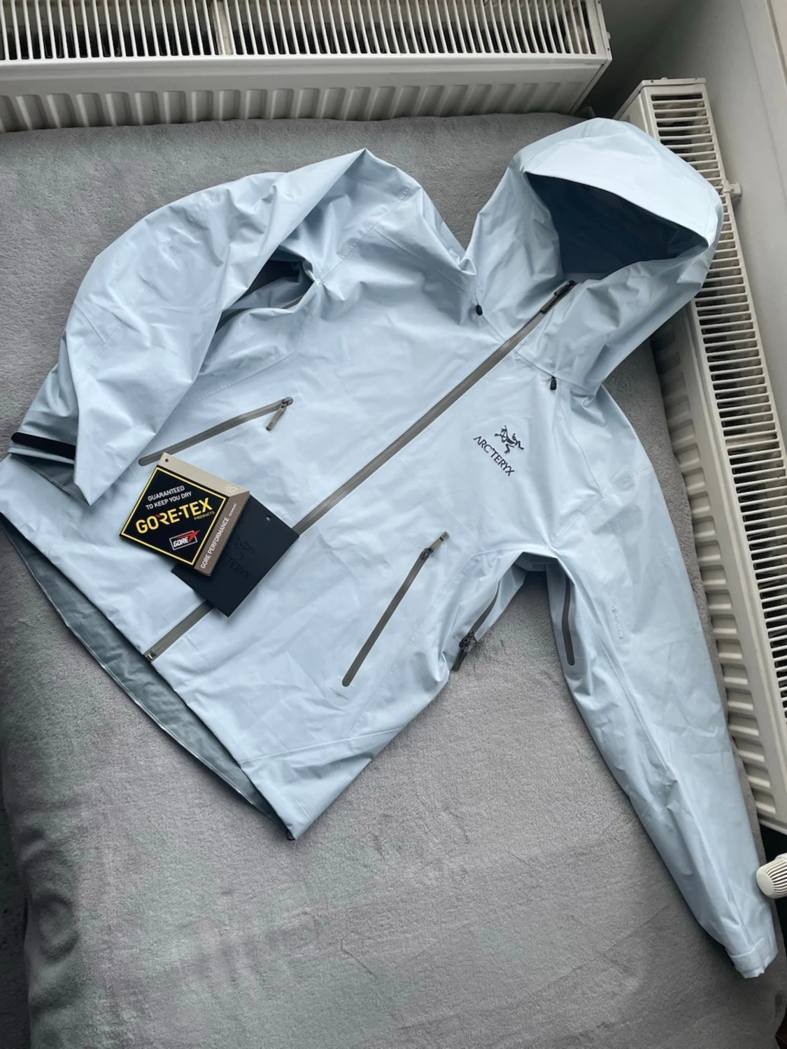 Ljusblå Arc'teryx vindjacka Gore-Tex